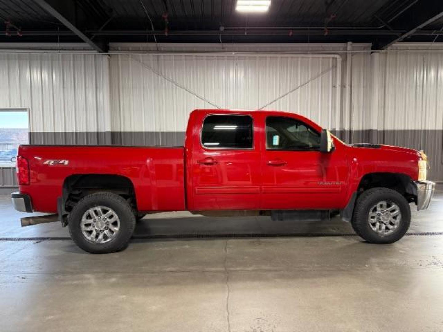 2013 Victory Red /Ebony Leather Interior Chevrolet Silverado 3500HD LTZ Crew Cab 4WD (1GC4K1E80DF) with an 6.6L V8 OHV 32V TURBO DIESEL engine, 6-Speed Automatic transmission, located at 1235 N Woodruff Ave., Idaho Falls, 83401, (208) 523-1053, 43.507172, -112.000488 - Photo#4