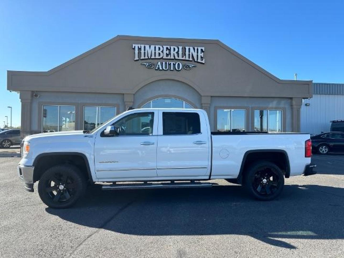 2015 Summit White /Cocoa/Dune, leather GMC Sierra 1500 SLT Crew Cab Short Box 4WD (3GTU2VEJ6FG) with an 6.2L V8 OHV 16V engine, 6-Speed Automatic transmission, located at 1235 N Woodruff Ave., Idaho Falls, 83401, (208) 523-1053, 43.507172, -112.000488 - Photo#2