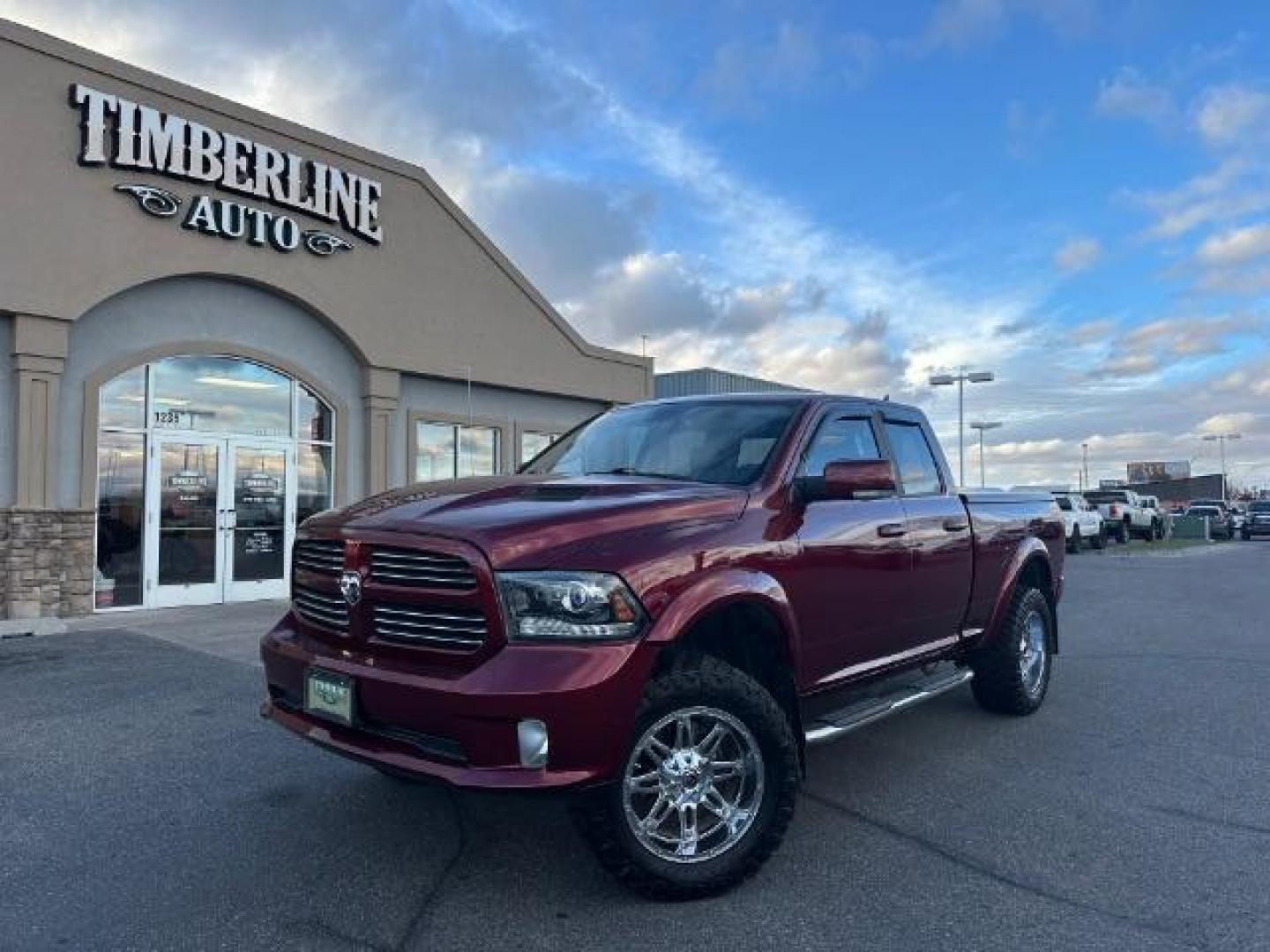 2017 Flame Red Clear Coat /Black, cloth RAM 1500 Sport Quad Cab 4WD (1C6RR7HT6HS) with an 5.7L V8 OHV 16V engine, 8-Speed Automatic transmission, located at 1235 N Woodruff Ave., Idaho Falls, 83401, (208) 523-1053, 43.507172, -112.000488 - Photo#0