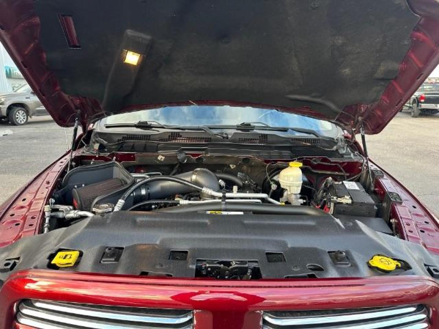 2017 Flame Red Clear Coat /Black, cloth RAM 1500 Sport Quad Cab 4WD (1C6RR7HT6HS) with an 5.7L V8 OHV 16V engine, 8-Speed Automatic transmission, located at 1235 N Woodruff Ave., Idaho Falls, 83401, (208) 523-1053, 43.507172, -112.000488 - Photo#9