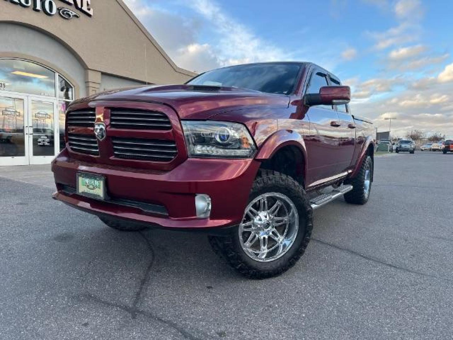 2017 Flame Red Clear Coat /Black, cloth RAM 1500 Sport Quad Cab 4WD (1C6RR7HT6HS) with an 5.7L V8 OHV 16V engine, 8-Speed Automatic transmission, located at 1235 N Woodruff Ave., Idaho Falls, 83401, (208) 523-1053, 43.507172, -112.000488 - Photo#1