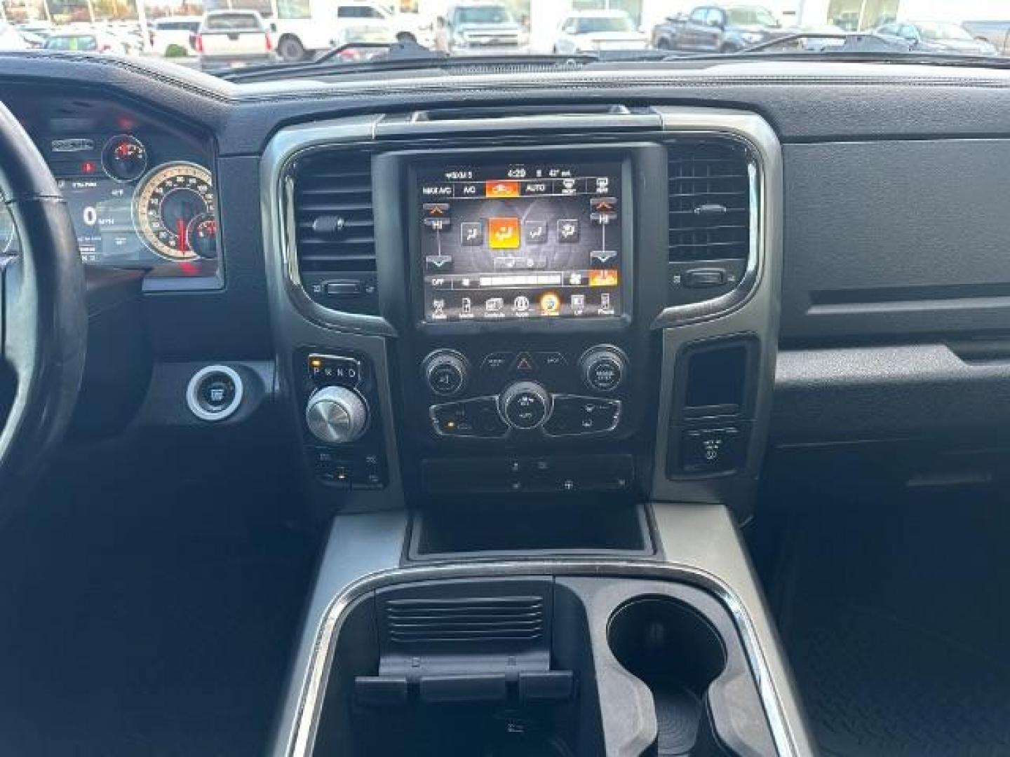 2017 Flame Red Clear Coat /Black, cloth RAM 1500 Sport Quad Cab 4WD (1C6RR7HT6HS) with an 5.7L V8 OHV 16V engine, 8-Speed Automatic transmission, located at 1235 N Woodruff Ave., Idaho Falls, 83401, (208) 523-1053, 43.507172, -112.000488 - Photo#26