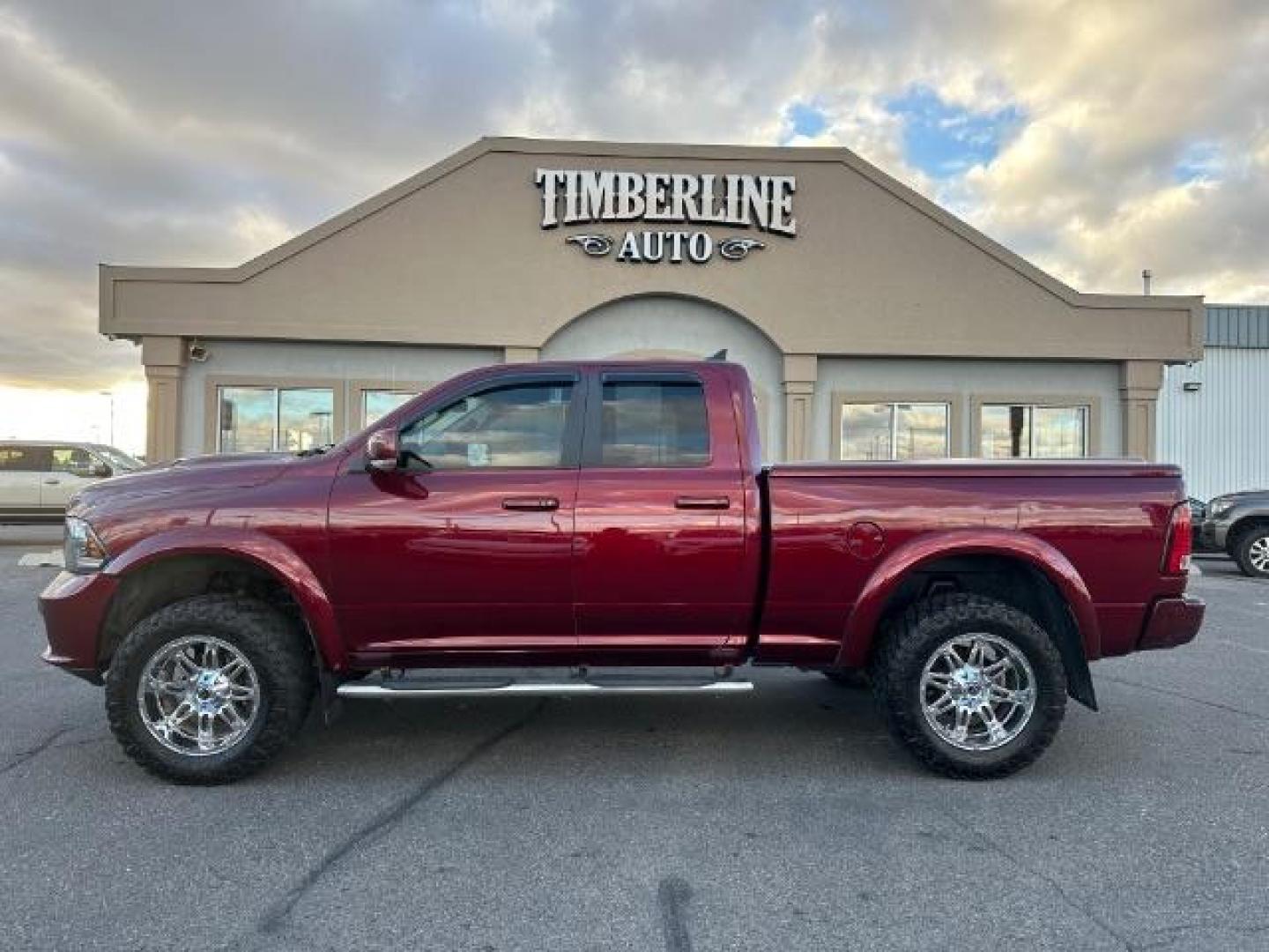 2017 Flame Red Clear Coat /Black, cloth RAM 1500 Sport Quad Cab 4WD (1C6RR7HT6HS) with an 5.7L V8 OHV 16V engine, 8-Speed Automatic transmission, located at 1235 N Woodruff Ave., Idaho Falls, 83401, (208) 523-1053, 43.507172, -112.000488 - Photo#2