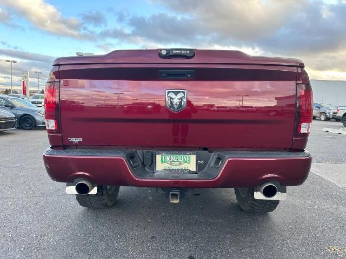 2017 Flame Red Clear Coat /Black, cloth RAM 1500 Sport Quad Cab 4WD (1C6RR7HT6HS) with an 5.7L V8 OHV 16V engine, 8-Speed Automatic transmission, located at 1235 N Woodruff Ave., Idaho Falls, 83401, (208) 523-1053, 43.507172, -112.000488 - Photo#3