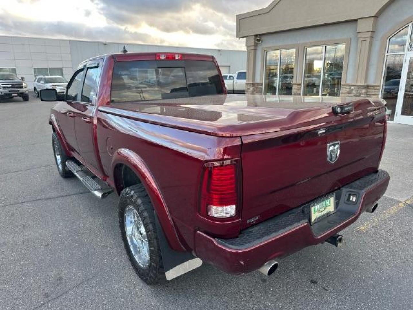 2017 Flame Red Clear Coat /Black, cloth RAM 1500 Sport Quad Cab 4WD (1C6RR7HT6HS) with an 5.7L V8 OHV 16V engine, 8-Speed Automatic transmission, located at 1235 N Woodruff Ave., Idaho Falls, 83401, (208) 523-1053, 43.507172, -112.000488 - Photo#4