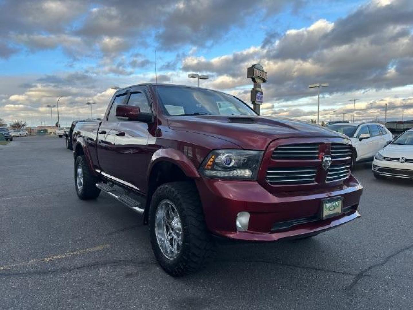 2017 Flame Red Clear Coat /Black, cloth RAM 1500 Sport Quad Cab 4WD (1C6RR7HT6HS) with an 5.7L V8 OHV 16V engine, 8-Speed Automatic transmission, located at 1235 N Woodruff Ave., Idaho Falls, 83401, (208) 523-1053, 43.507172, -112.000488 - Photo#7