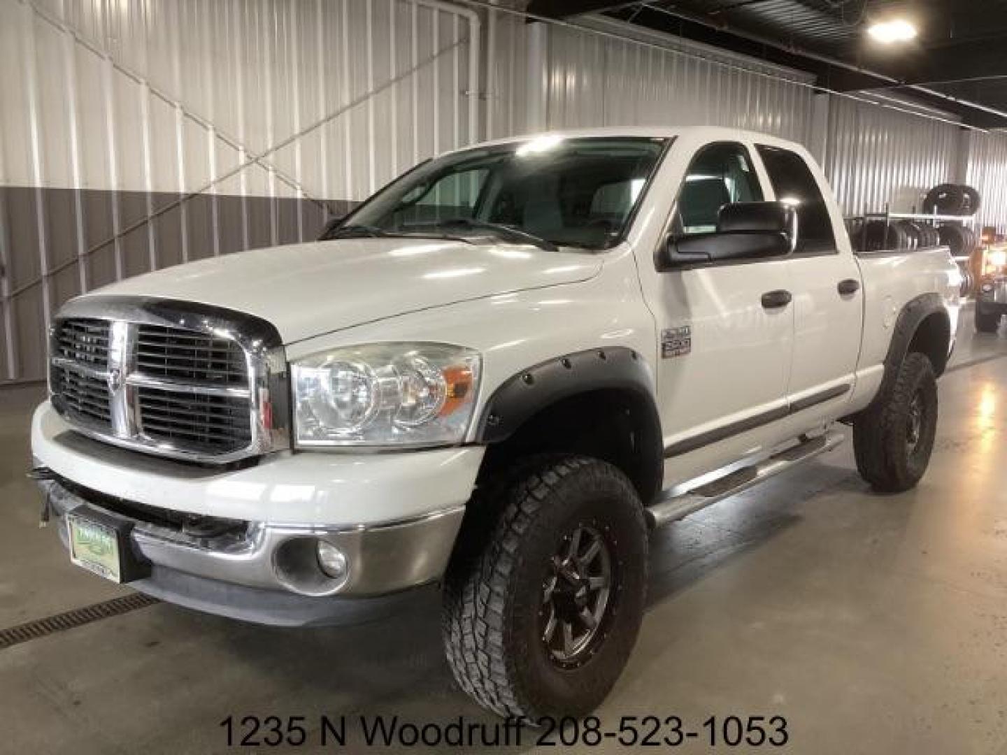 2007 Bright White /Medium Slate Gray Cloth Interior Dodge Ram 2500 SLT Quad Cab 4WD (1D7KS28A57J) with an 6.7L L6 OHV 24V TURBO DIESEL engine, 5-Speed Automatic transmission, located at 1235 N Woodruff Ave., Idaho Falls, 83401, (208) 523-1053, 43.507172, -112.000488 - Photo#0