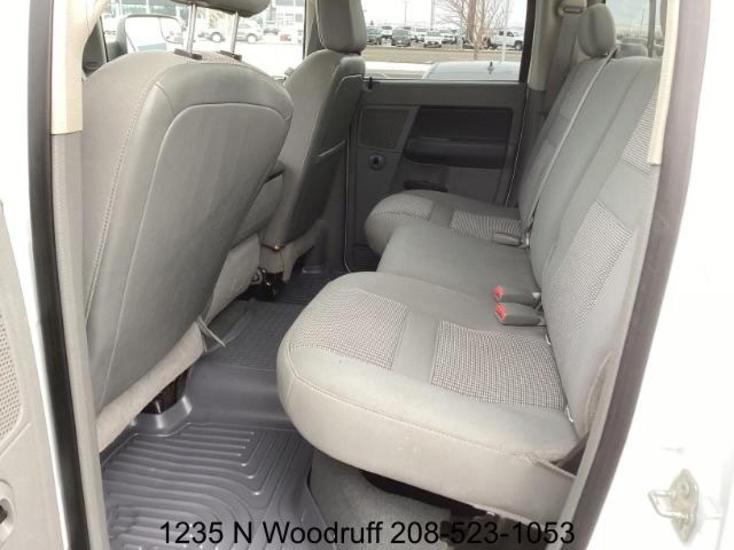 2007 Bright White /Medium Slate Gray Cloth Interior Dodge Ram 2500 SLT Quad Cab 4WD (1D7KS28A57J) with an 6.7L L6 OHV 24V TURBO DIESEL engine, 5-Speed Automatic transmission, located at 1235 N Woodruff Ave., Idaho Falls, 83401, (208) 523-1053, 43.507172, -112.000488 - Photo#12