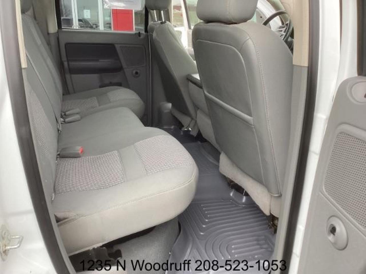 2007 Bright White /Medium Slate Gray Cloth Interior Dodge Ram 2500 SLT Quad Cab 4WD (1D7KS28A57J) with an 6.7L L6 OHV 24V TURBO DIESEL engine, 5-Speed Automatic transmission, located at 1235 N Woodruff Ave., Idaho Falls, 83401, (208) 523-1053, 43.507172, -112.000488 - Photo#13