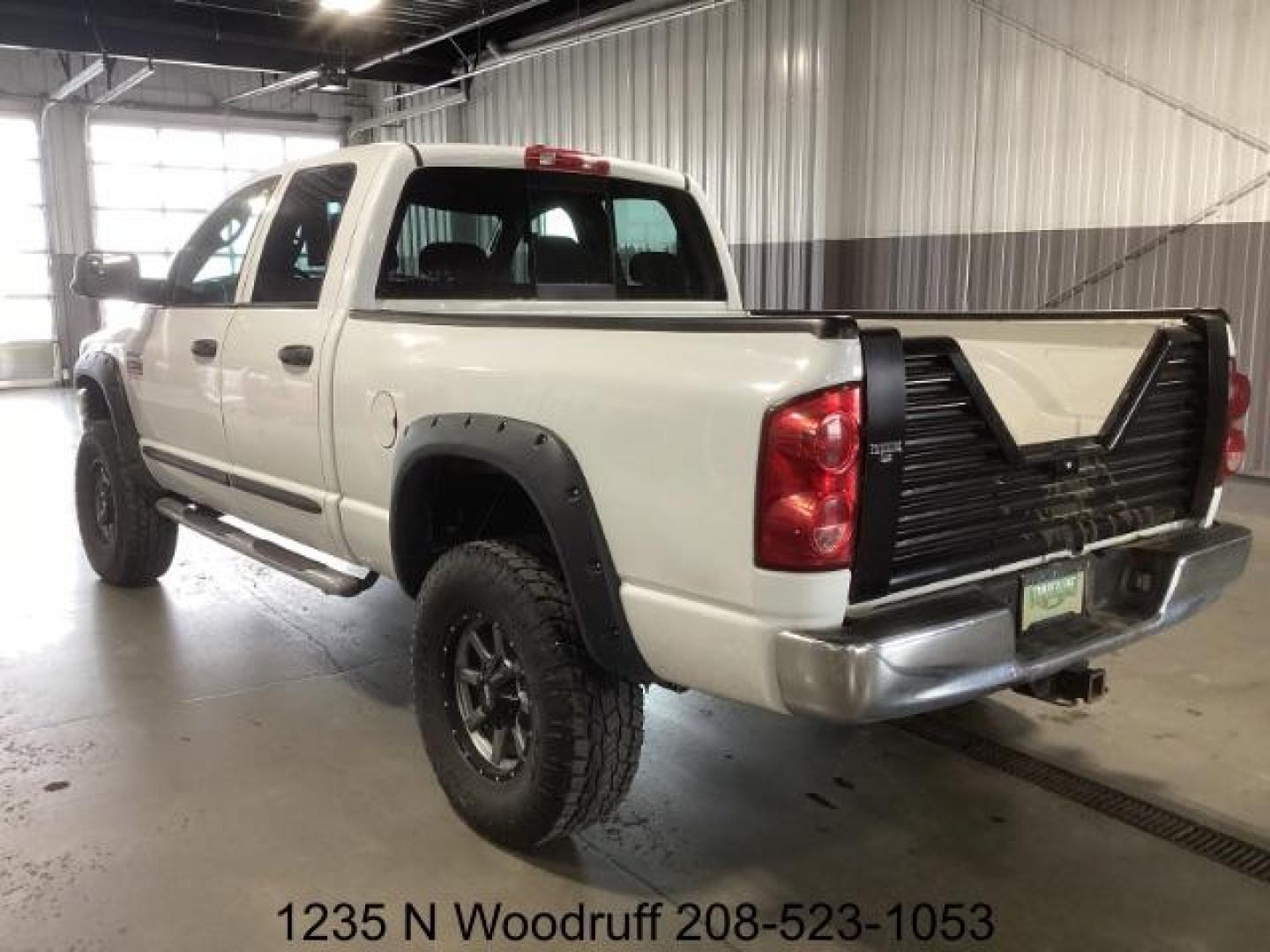 2007 Bright White /Medium Slate Gray Cloth Interior Dodge Ram 2500 SLT Quad Cab 4WD (1D7KS28A57J) with an 6.7L L6 OHV 24V TURBO DIESEL engine, 5-Speed Automatic transmission, located at 1235 N Woodruff Ave., Idaho Falls, 83401, (208) 523-1053, 43.507172, -112.000488 - Photo#2