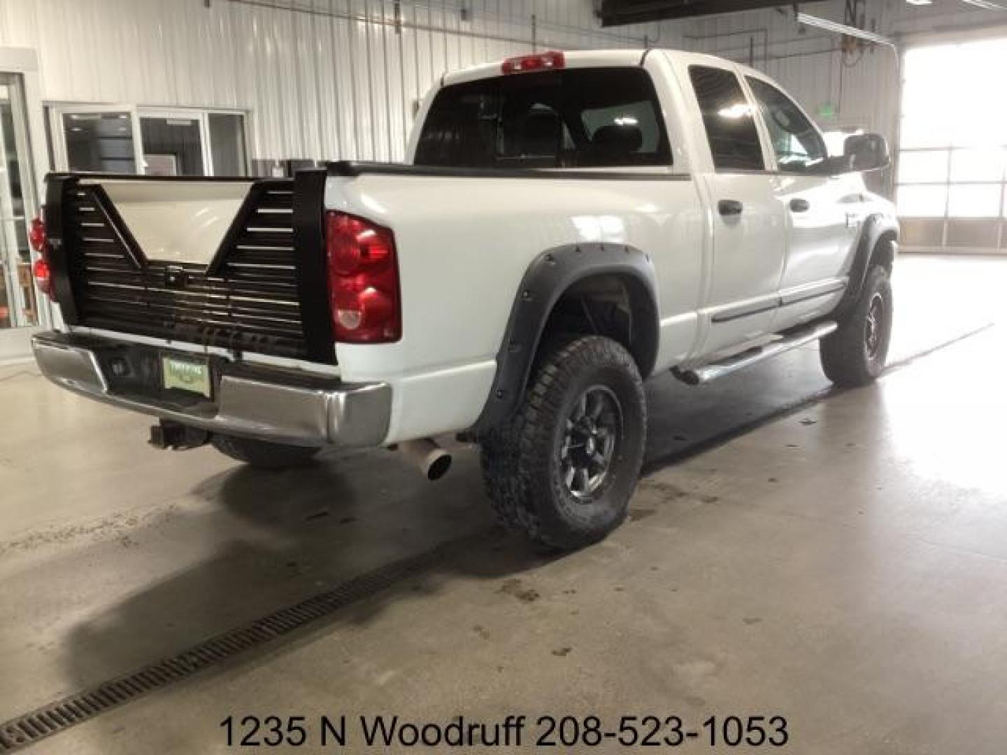 2007 Bright White /Medium Slate Gray Cloth Interior Dodge Ram 2500 SLT Quad Cab 4WD (1D7KS28A57J) with an 6.7L L6 OHV 24V TURBO DIESEL engine, 5-Speed Automatic transmission, located at 1235 N Woodruff Ave., Idaho Falls, 83401, (208) 523-1053, 43.507172, -112.000488 - Photo#3