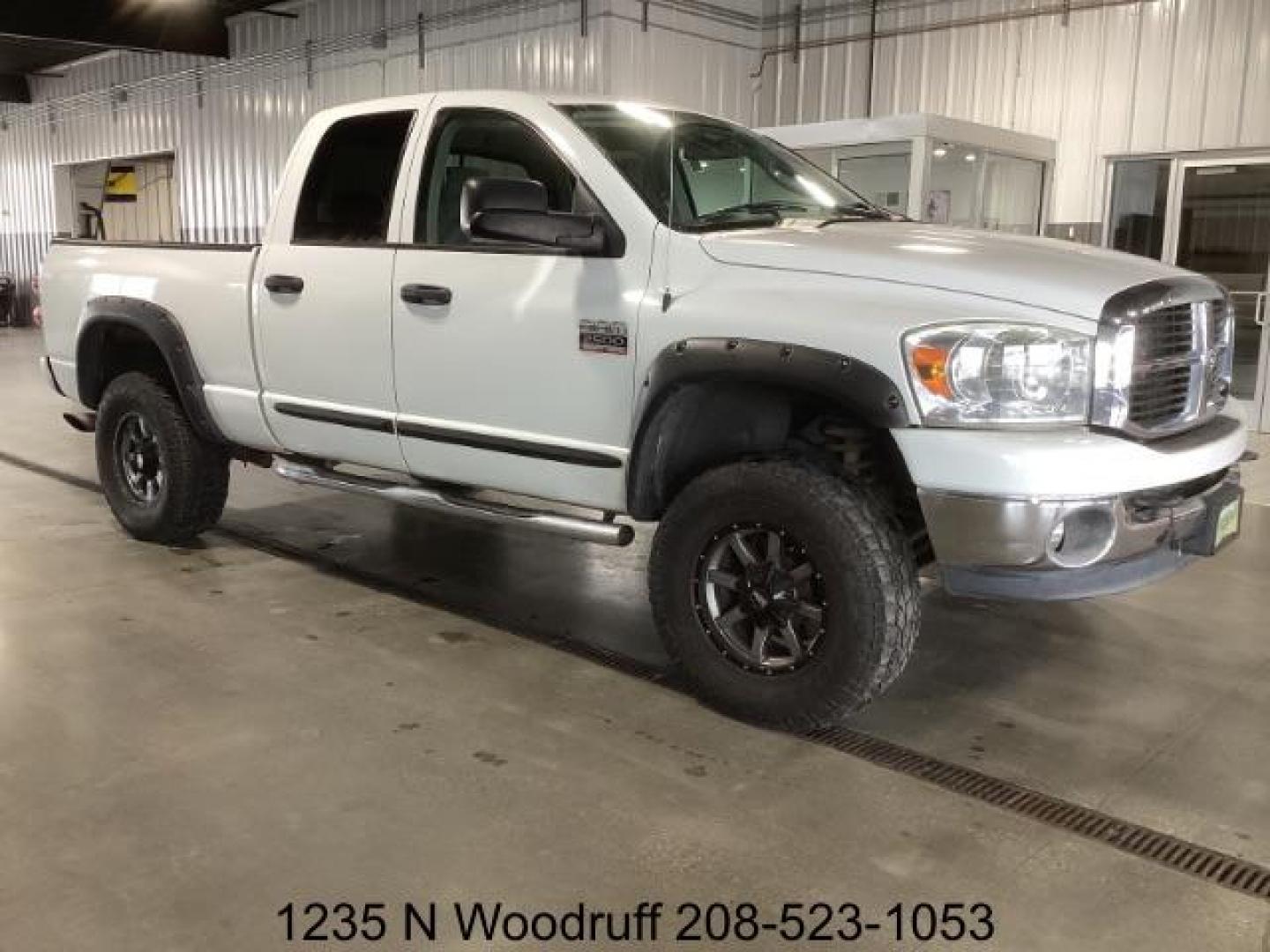 2007 Bright White /Medium Slate Gray Cloth Interior Dodge Ram 2500 SLT Quad Cab 4WD (1D7KS28A57J) with an 6.7L L6 OHV 24V TURBO DIESEL engine, 5-Speed Automatic transmission, located at 1235 N Woodruff Ave., Idaho Falls, 83401, (208) 523-1053, 43.507172, -112.000488 - Photo#4