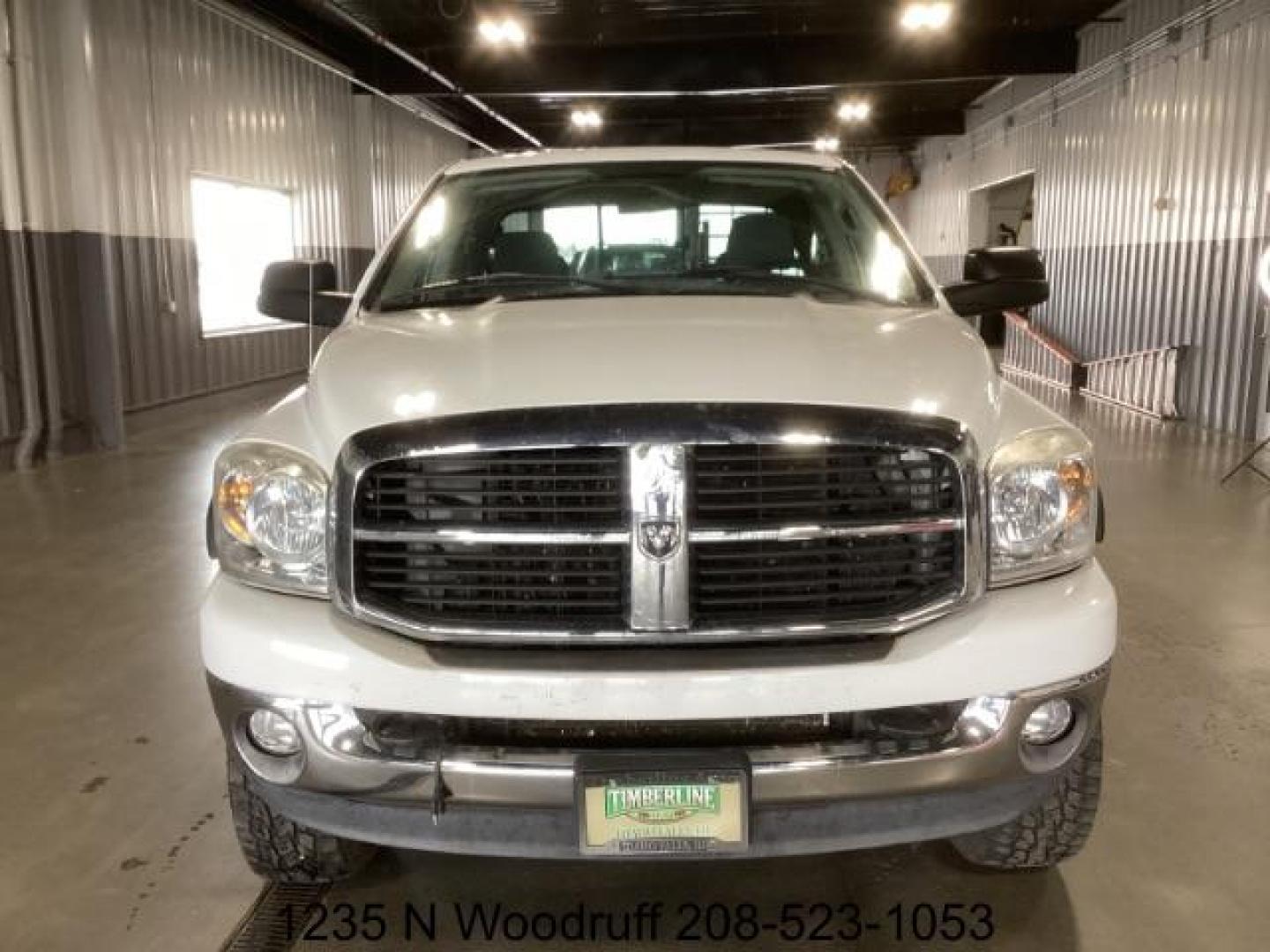 2007 Bright White /Medium Slate Gray Cloth Interior Dodge Ram 2500 SLT Quad Cab 4WD (1D7KS28A57J) with an 6.7L L6 OHV 24V TURBO DIESEL engine, 5-Speed Automatic transmission, located at 1235 N Woodruff Ave., Idaho Falls, 83401, (208) 523-1053, 43.507172, -112.000488 - Photo#5