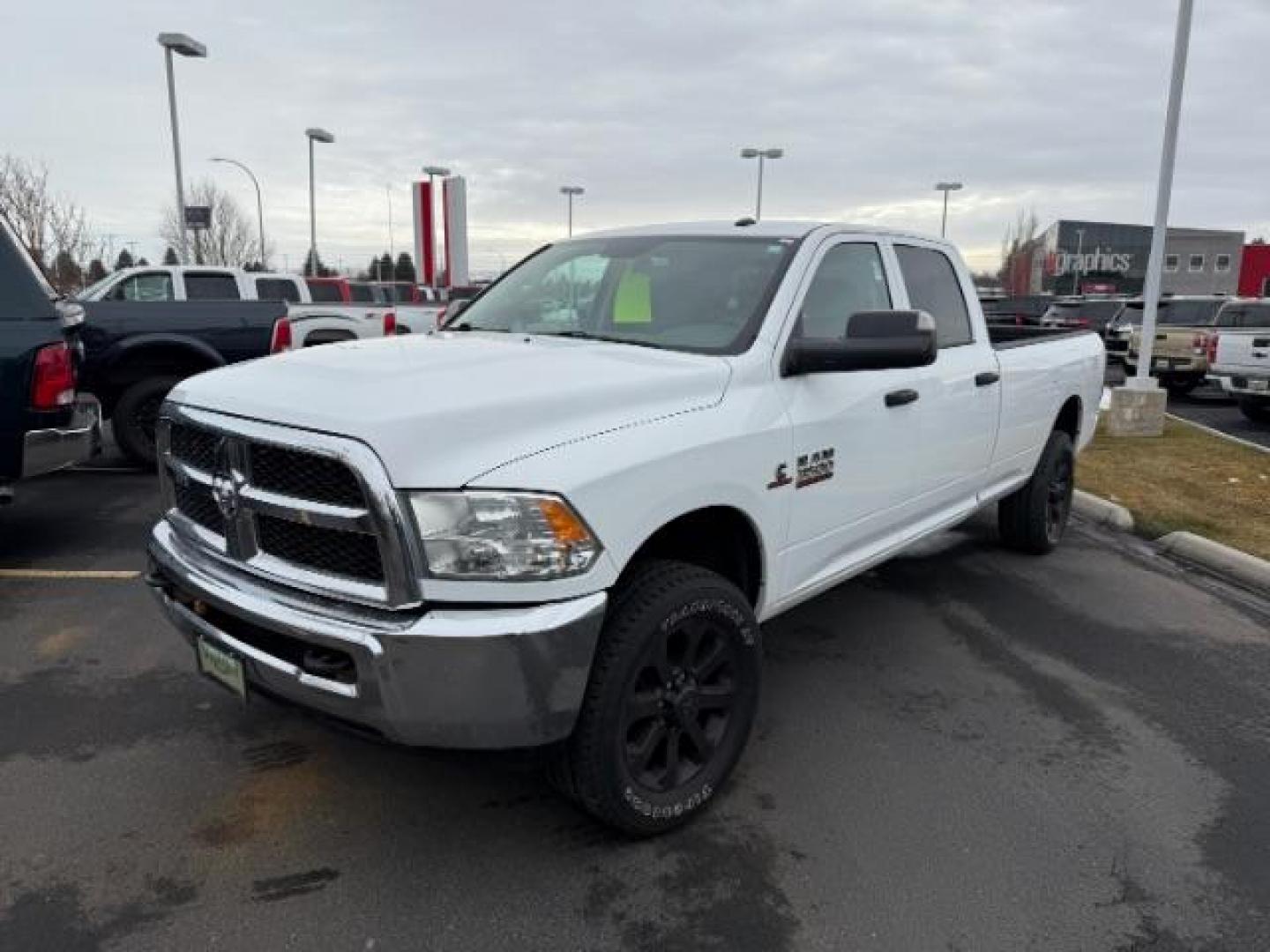 2018 WHITE /Black/Diesel Gray, cloth RAM 3500 Tradesman Crew Cab 4WD (3C63R3GL0JG) with an 6.7L L6 OHV 24V TURBO DIESEL engine, 6-Speed Automatic transmission, located at 1235 N Woodruff Ave., Idaho Falls, 83401, (208) 523-1053, 43.507172, -112.000488 - Photo#0