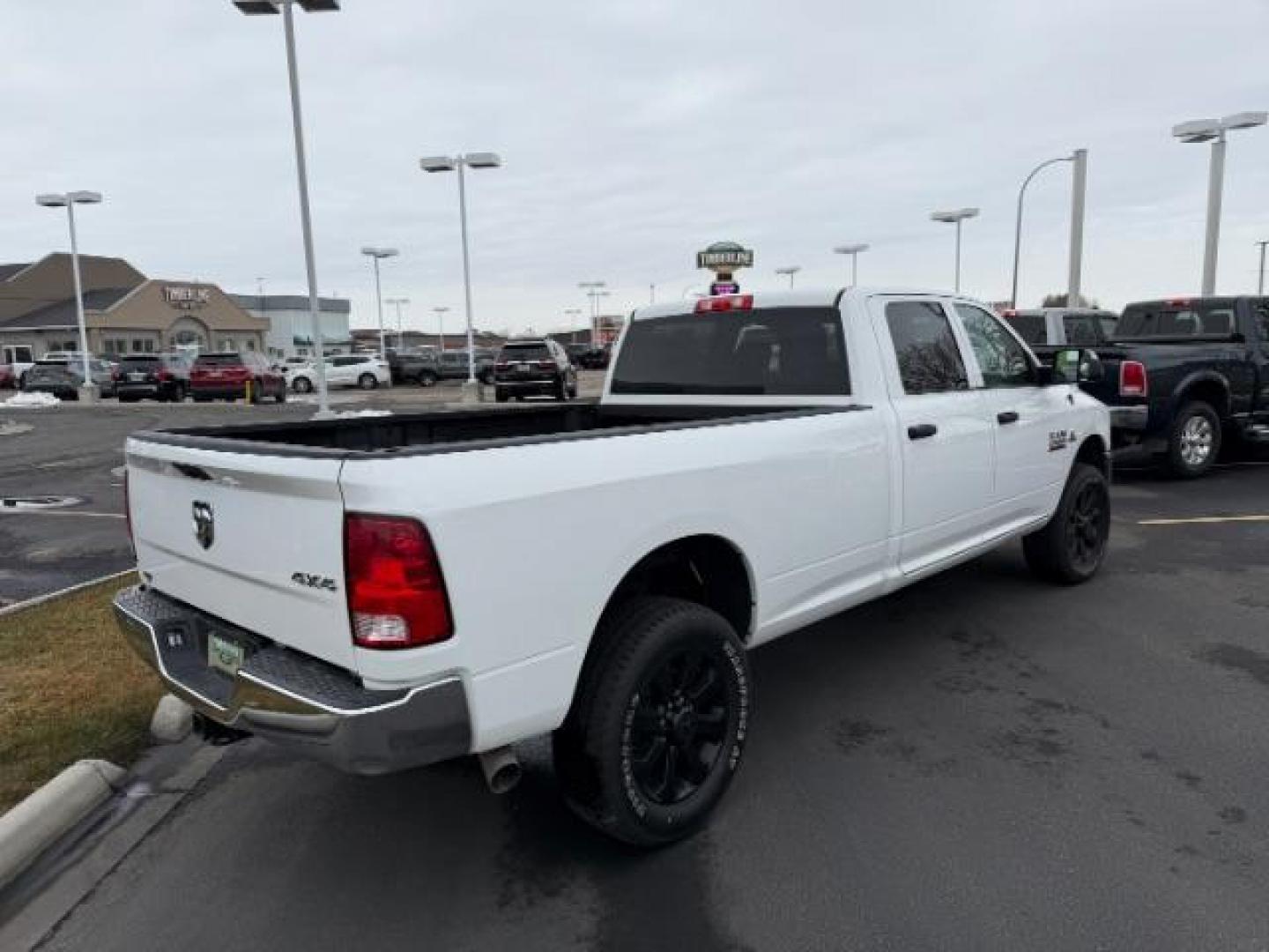 2018 WHITE /Black/Diesel Gray, cloth RAM 3500 Tradesman Crew Cab 4WD (3C63R3GL0JG) with an 6.7L L6 OHV 24V TURBO DIESEL engine, 6-Speed Automatic transmission, located at 1235 N Woodruff Ave., Idaho Falls, 83401, (208) 523-1053, 43.507172, -112.000488 - Photo#4