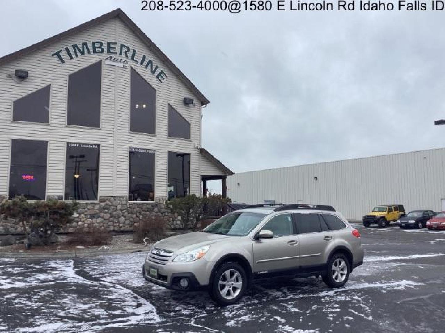 2014 GOLD Subaru Outback 2.5I Premium (4S4BRBDC2E3) with an 2.5L H4 DOHC 16V engine, located at 1235 N Woodruff Ave., Idaho Falls, 83401, (208) 523-1053, 43.507172, -112.000488 - Photo#0