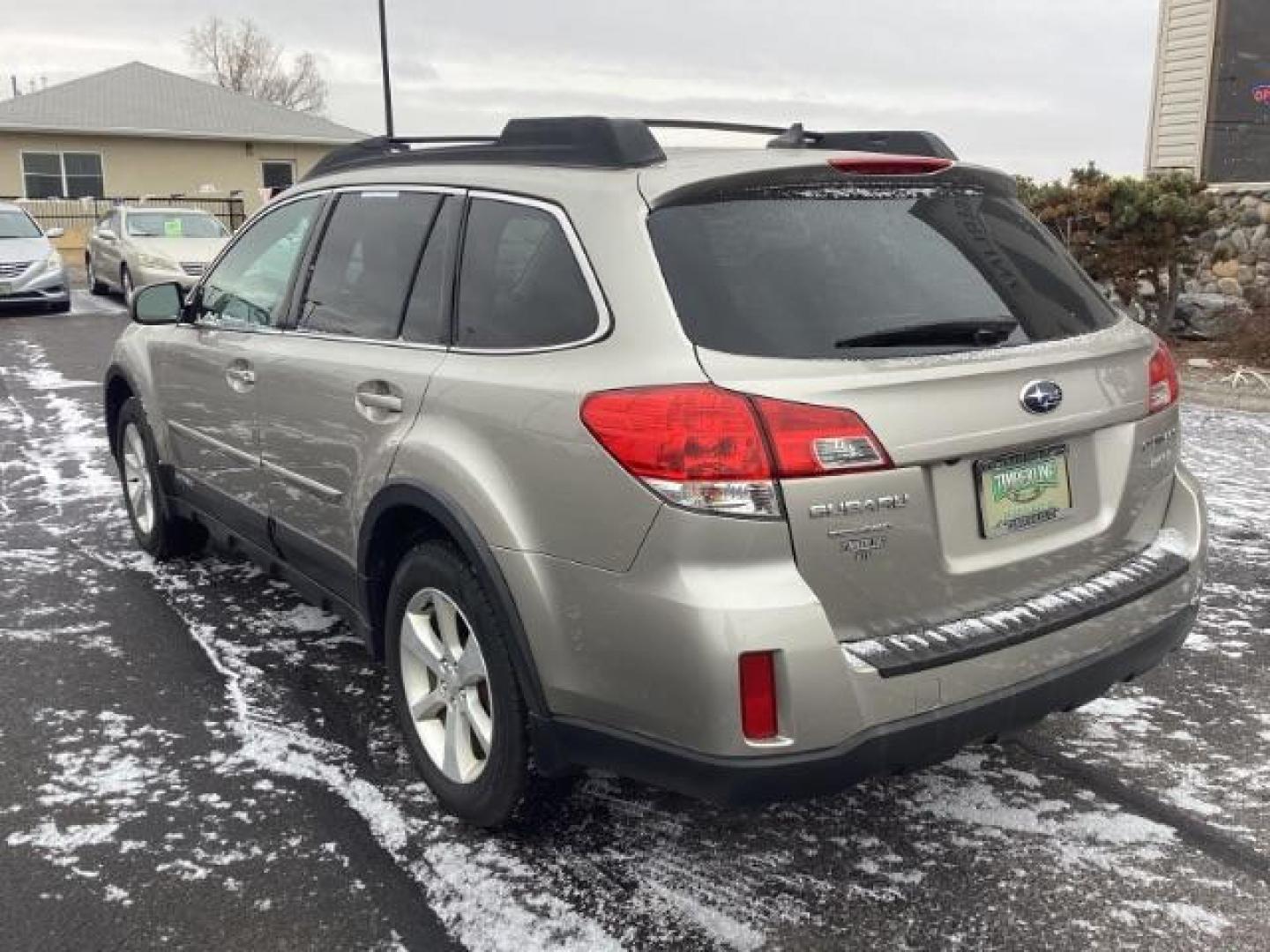 2014 GOLD Subaru Outback 2.5I Premium (4S4BRBDC2E3) with an 2.5L H4 DOHC 16V engine, located at 1235 N Woodruff Ave., Idaho Falls, 83401, (208) 523-1053, 43.507172, -112.000488 - Photo#2