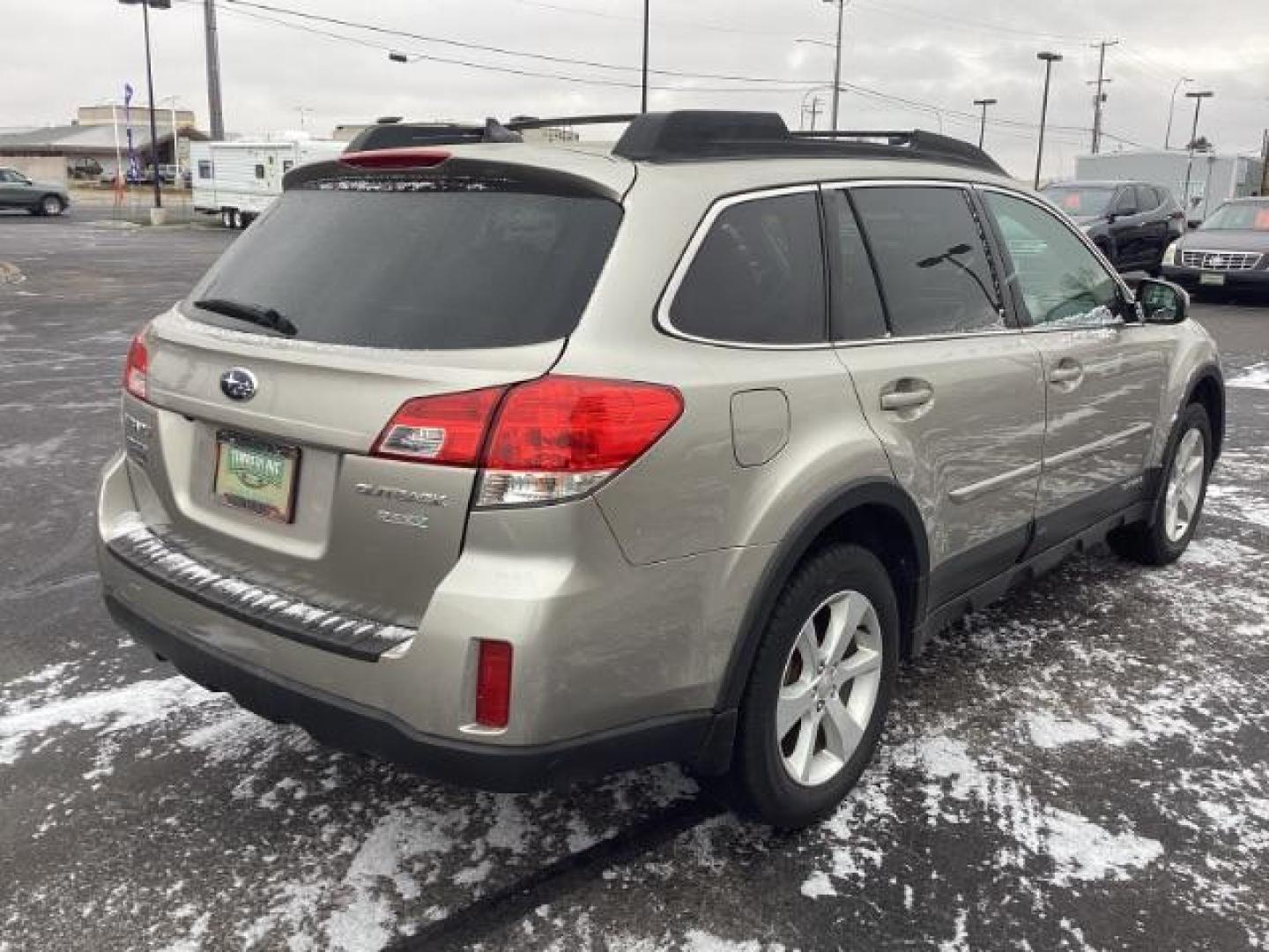 2014 GOLD Subaru Outback 2.5I Premium (4S4BRBDC2E3) with an 2.5L H4 DOHC 16V engine, located at 1235 N Woodruff Ave., Idaho Falls, 83401, (208) 523-1053, 43.507172, -112.000488 - Photo#4