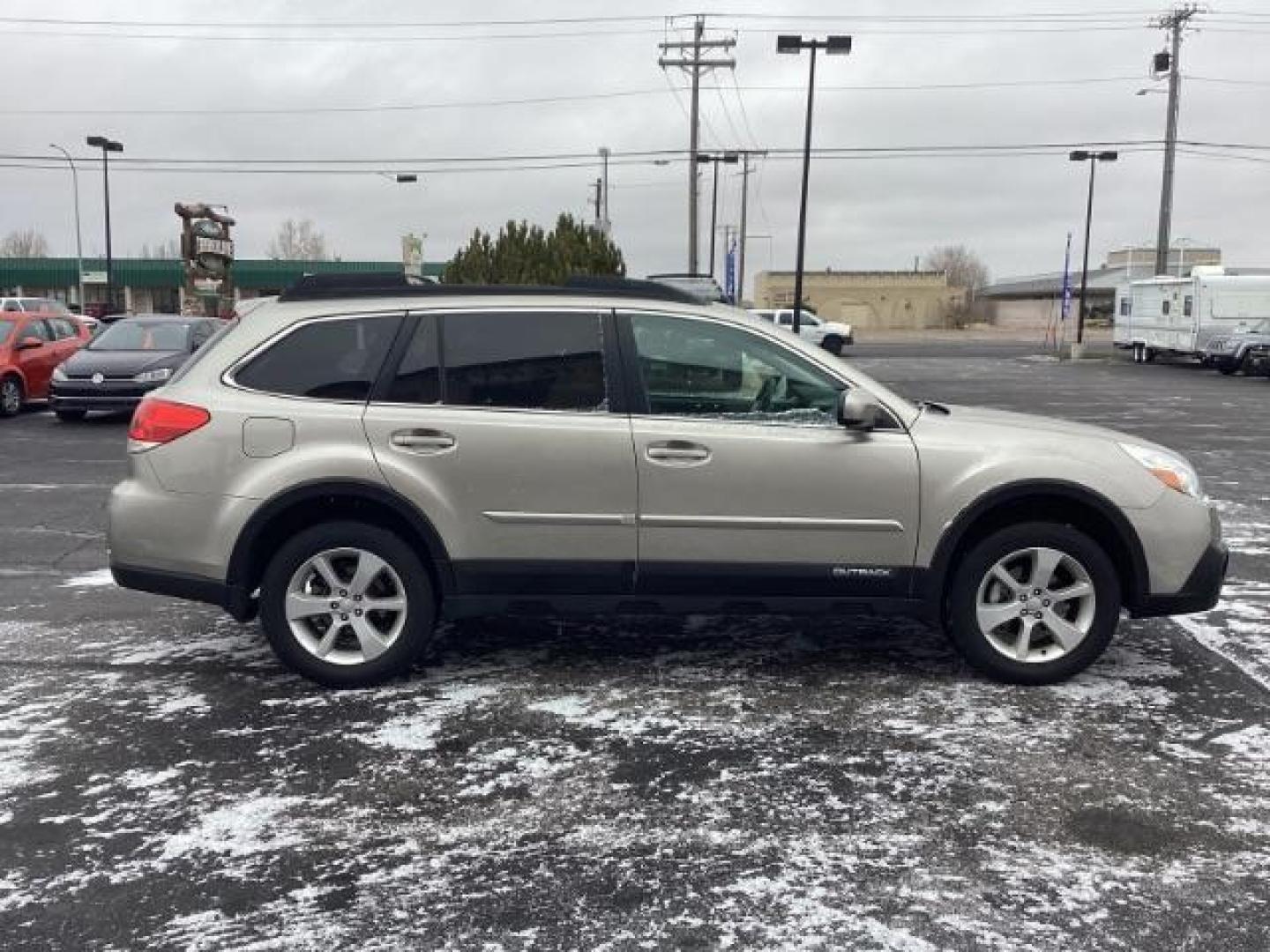 2014 GOLD Subaru Outback 2.5I Premium (4S4BRBDC2E3) with an 2.5L H4 DOHC 16V engine, located at 1235 N Woodruff Ave., Idaho Falls, 83401, (208) 523-1053, 43.507172, -112.000488 - Photo#5