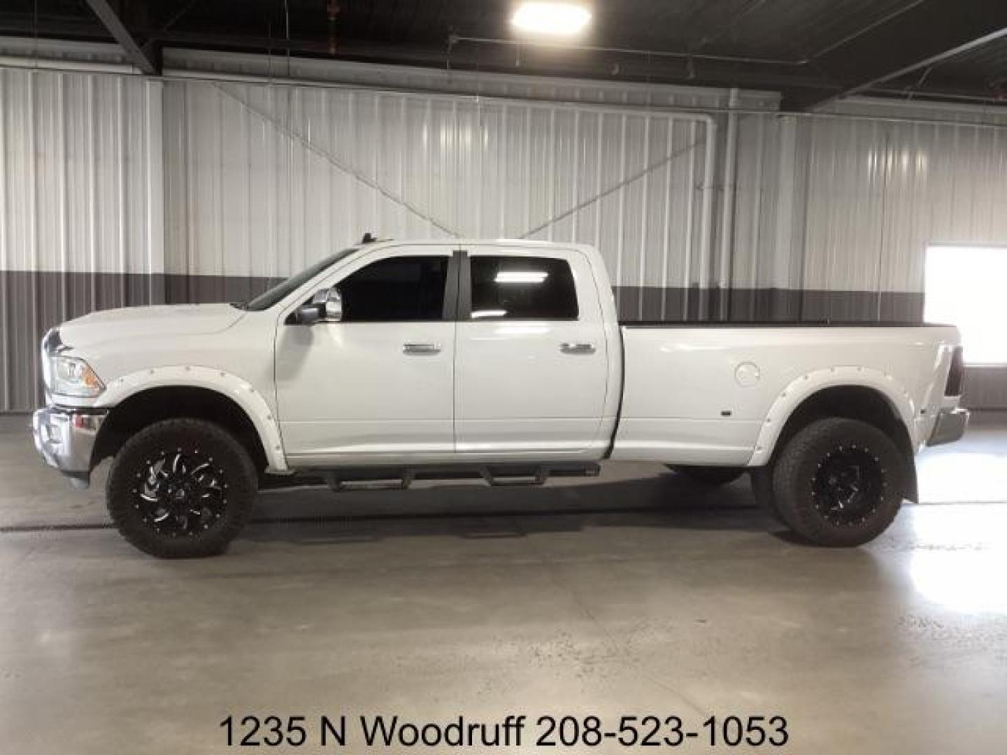 2015 WHITE /Black, leather RAM 3500 Laramie Crew Cab LWB 4WD DRW (3C63RRJL1FG) with an 6.7L L6 OHV 24V TURBO DIESEL engine, 6-Speed Automatic transmission, located at 1235 N Woodruff Ave., Idaho Falls, 83401, (208) 523-1053, 43.507172, -112.000488 - Photo#1