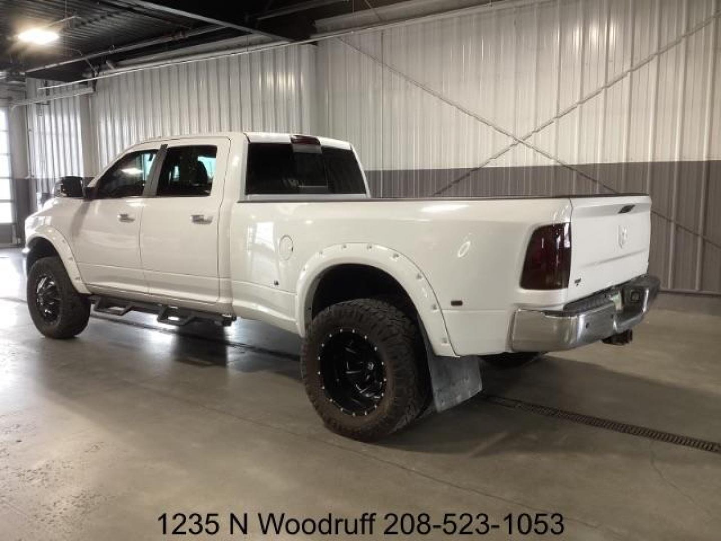 2015 WHITE /Black, leather RAM 3500 Laramie Crew Cab LWB 4WD DRW (3C63RRJL1FG) with an 6.7L L6 OHV 24V TURBO DIESEL engine, 6-Speed Automatic transmission, located at 1235 N Woodruff Ave., Idaho Falls, 83401, (208) 523-1053, 43.507172, -112.000488 - Photo#2