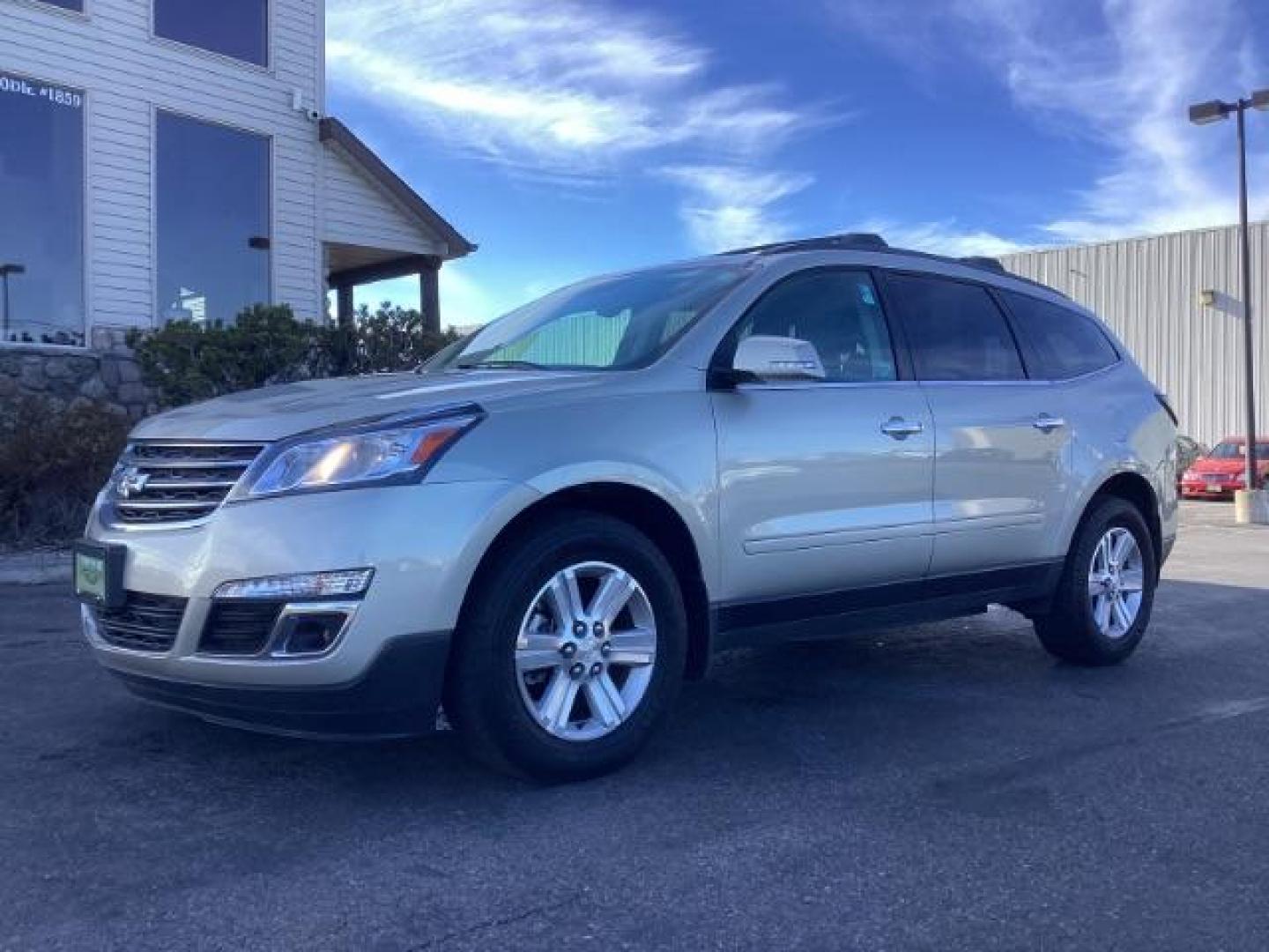 2014 Champagne Silver Metallic Chevrolet Traverse 2LT AWD (1GNKVHKD9EJ) with an 3.6L V6 DOHC 24V engine, 6-Speed Automatic transmission, located at 1235 N Woodruff Ave., Idaho Falls, 83401, (208) 523-1053, 43.507172, -112.000488 - Photo#1