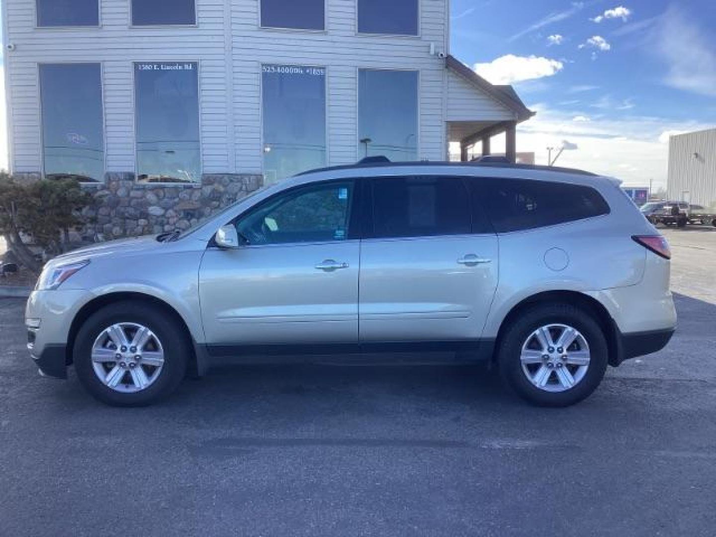 2014 Champagne Silver Metallic Chevrolet Traverse 2LT AWD (1GNKVHKD9EJ) with an 3.6L V6 DOHC 24V engine, 6-Speed Automatic transmission, located at 1235 N Woodruff Ave., Idaho Falls, 83401, (208) 523-1053, 43.507172, -112.000488 - Photo#2