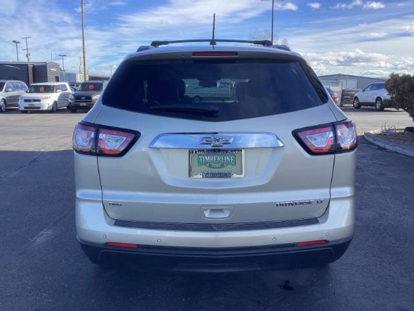 2014 Champagne Silver Metallic Chevrolet Traverse 2LT AWD (1GNKVHKD9EJ) with an 3.6L V6 DOHC 24V engine, 6-Speed Automatic transmission, located at 1235 N Woodruff Ave., Idaho Falls, 83401, (208) 523-1053, 43.507172, -112.000488 - Photo#4