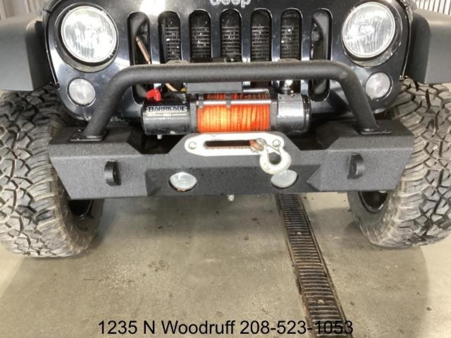 2014 Black Clearcoat /Black Jeep Wrangler Rubicon 4WD (1C4BJWCG6EL) with an 3.6L V6 DOHC 24V FFV engine, 5-Speed Automatic transmission, located at 1235 N Woodruff Ave., Idaho Falls, 83401, (208) 523-1053, 43.507172, -112.000488 - Photo#10