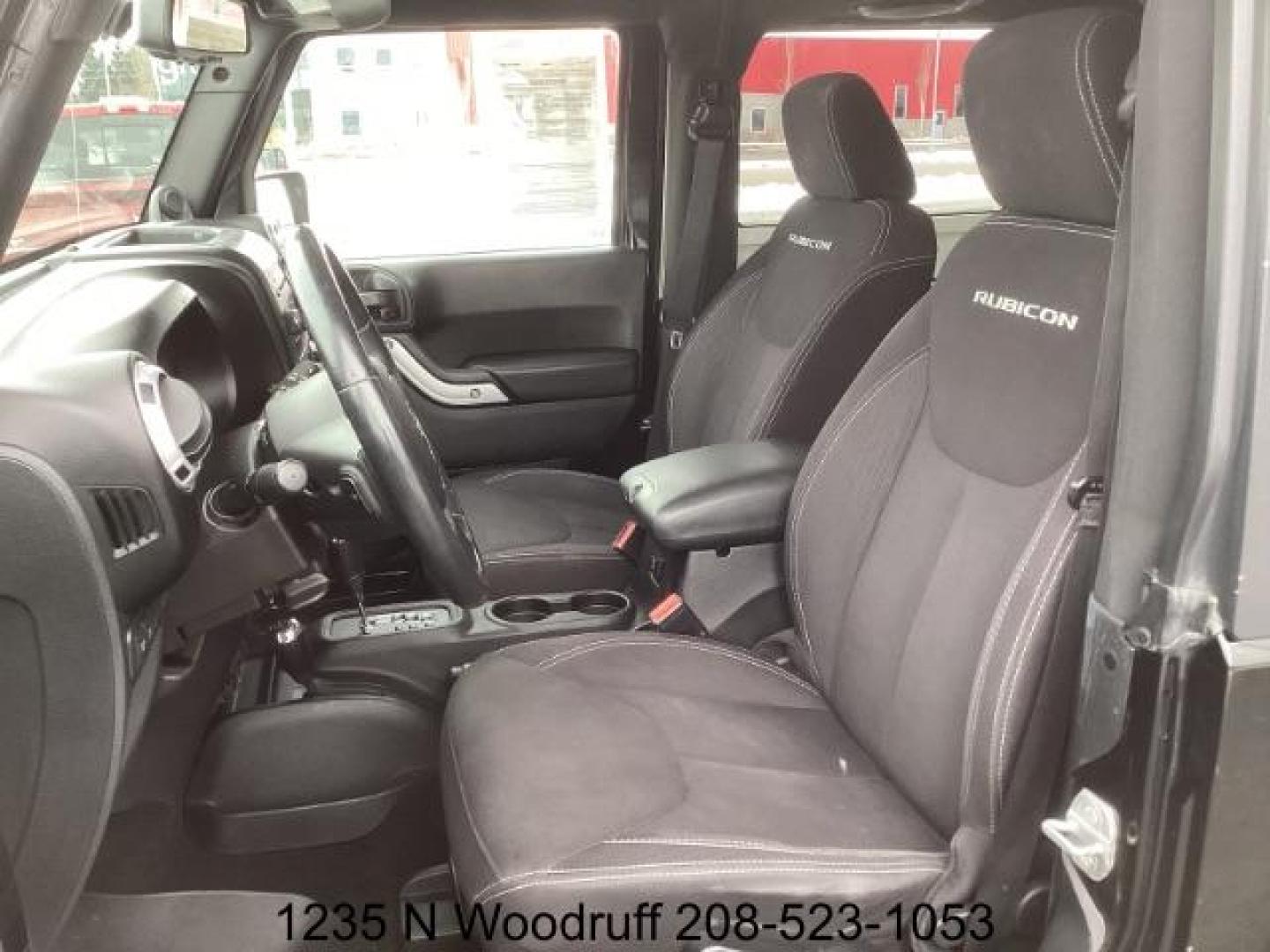 2014 Black Clearcoat /Black Jeep Wrangler Rubicon 4WD (1C4BJWCG6EL) with an 3.6L V6 DOHC 24V FFV engine, 5-Speed Automatic transmission, located at 1235 N Woodruff Ave., Idaho Falls, 83401, (208) 523-1053, 43.507172, -112.000488 - Photo#13