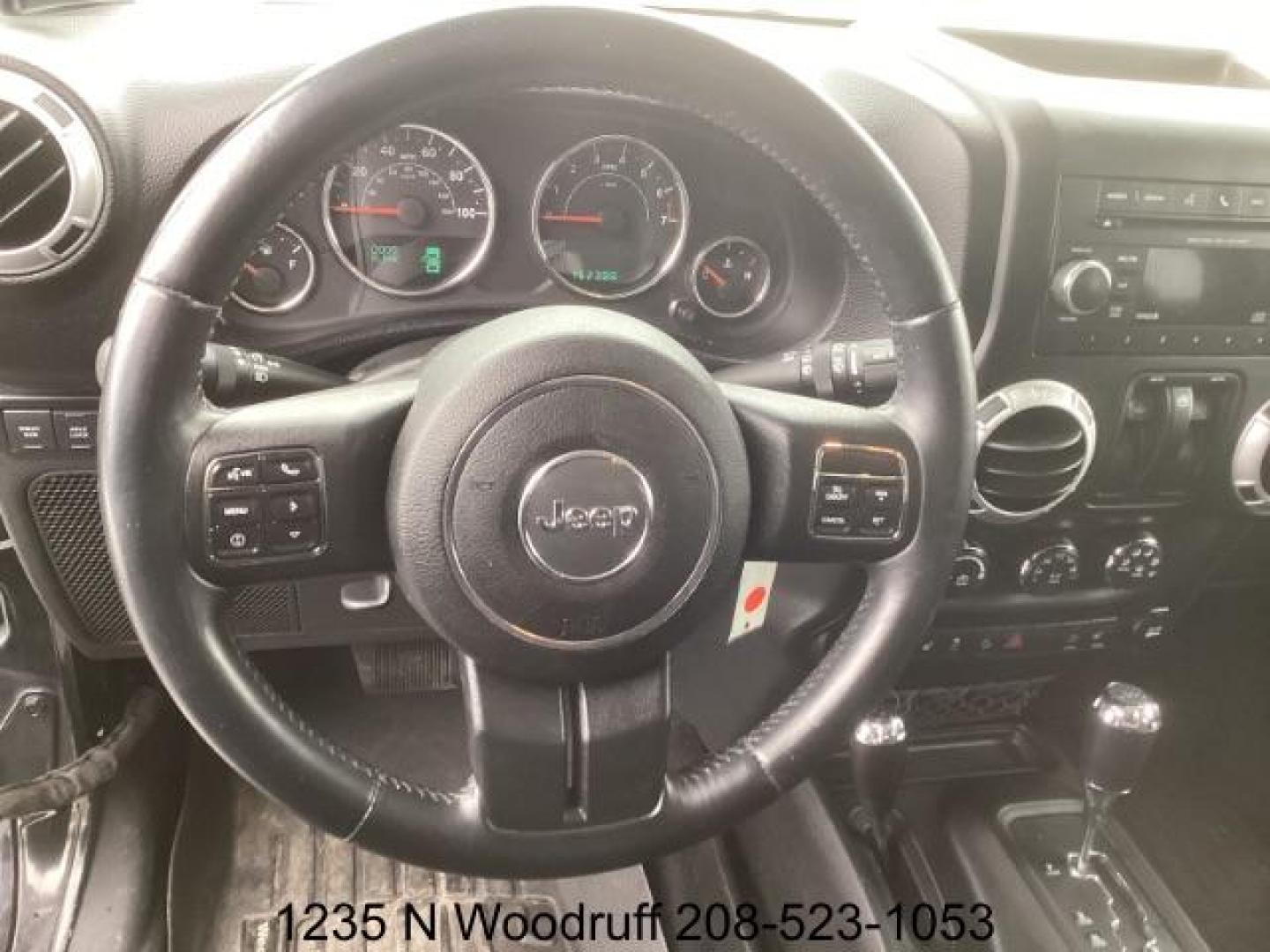 2014 Black Clearcoat /Black Jeep Wrangler Rubicon 4WD (1C4BJWCG6EL) with an 3.6L V6 DOHC 24V FFV engine, 5-Speed Automatic transmission, located at 1235 N Woodruff Ave., Idaho Falls, 83401, (208) 523-1053, 43.507172, -112.000488 - Photo#14