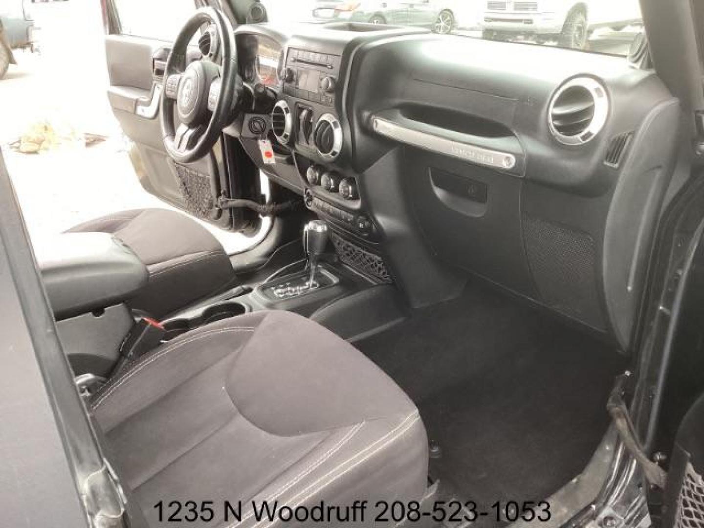 2014 Black Clearcoat /Black Jeep Wrangler Rubicon 4WD (1C4BJWCG6EL) with an 3.6L V6 DOHC 24V FFV engine, 5-Speed Automatic transmission, located at 1235 N Woodruff Ave., Idaho Falls, 83401, (208) 523-1053, 43.507172, -112.000488 - Photo#18