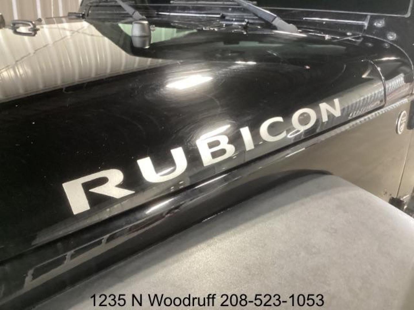 2014 Black Clearcoat /Black Jeep Wrangler Rubicon 4WD (1C4BJWCG6EL) with an 3.6L V6 DOHC 24V FFV engine, 5-Speed Automatic transmission, located at 1235 N Woodruff Ave., Idaho Falls, 83401, (208) 523-1053, 43.507172, -112.000488 - Photo#4