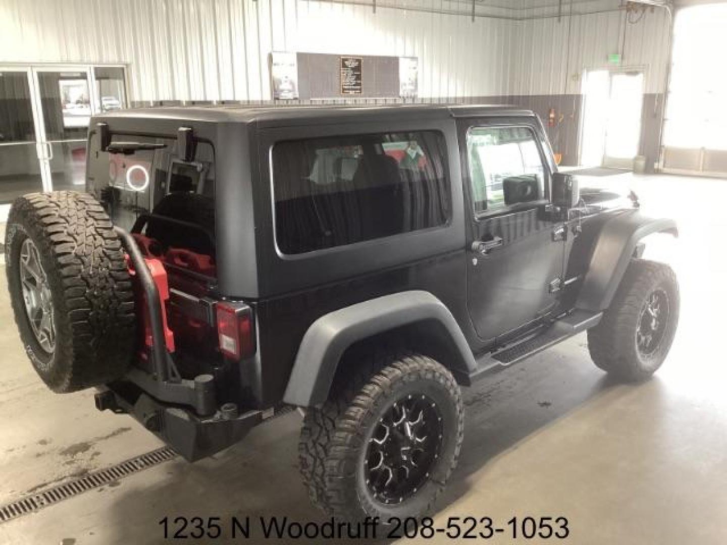 2014 Black Clearcoat /Black Jeep Wrangler Rubicon 4WD (1C4BJWCG6EL) with an 3.6L V6 DOHC 24V FFV engine, 5-Speed Automatic transmission, located at 1235 N Woodruff Ave., Idaho Falls, 83401, (208) 523-1053, 43.507172, -112.000488 - Photo#6