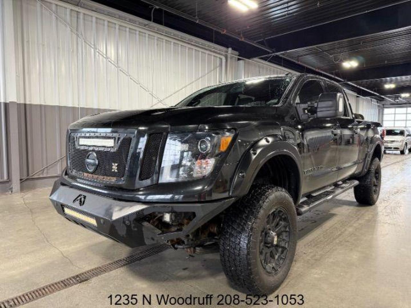 2018 BLACK /Black, leather Nissan Titan XD PRO-4X Crew Cab 4WD Diesel (1N6BA1F4XJN) with an 5.0L V8 DOHC 32V DIESEL engine, 6-Speed Automatic transmission, located at 1235 N Woodruff Ave., Idaho Falls, 83401, (208) 523-1053, 43.507172, -112.000488 - Photo#0