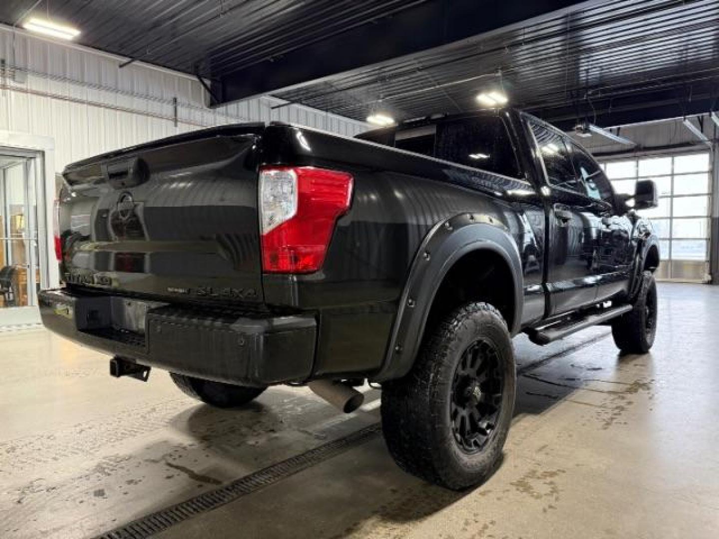 2018 BLACK /Black, leather Nissan Titan XD PRO-4X Crew Cab 4WD Diesel (1N6BA1F4XJN) with an 5.0L V8 DOHC 32V DIESEL engine, 6-Speed Automatic transmission, located at 1235 N Woodruff Ave., Idaho Falls, 83401, (208) 523-1053, 43.507172, -112.000488 - Photo#3