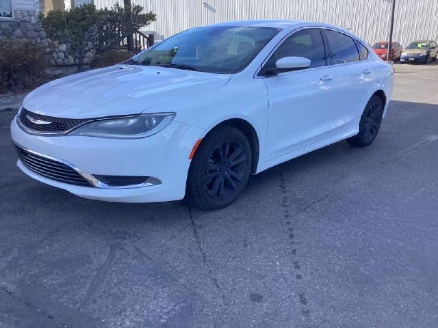 2015 Chrysler 200 Limited (1C3CCCAB5FN) with an 2.4L L4 DOHC 16V engine, 9-Speed Automatic transmission, located at 1235 N Woodruff Ave., Idaho Falls, 83401, (208) 523-1053, 43.507172, -112.000488 - Photo#1