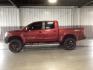 2014 Venetian Ruby /Charcoal II Nissan Titan PRO-4X Crew Cab 4WD SWB (1N6AA0ECXEN) with an 5.6L V8 DOHC 32V engine, 5-Speed Automatic transmission, located at 1235 N Woodruff Ave., Idaho Falls, 83401, (208) 523-1053, 43.507172, -112.000488 - Photo#1