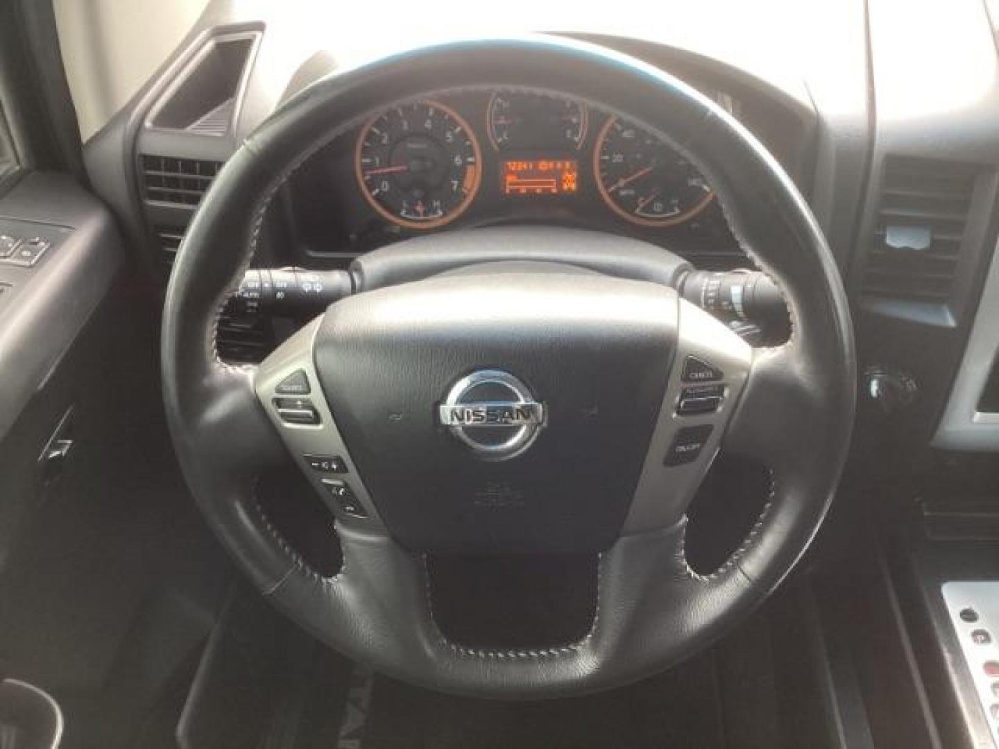 2014 Venetian Ruby /Charcoal II Nissan Titan PRO-4X Crew Cab 4WD SWB (1N6AA0ECXEN) with an 5.6L V8 DOHC 32V engine, 5-Speed Automatic transmission, located at 1235 N Woodruff Ave., Idaho Falls, 83401, (208) 523-1053, 43.507172, -112.000488 - Photo#23