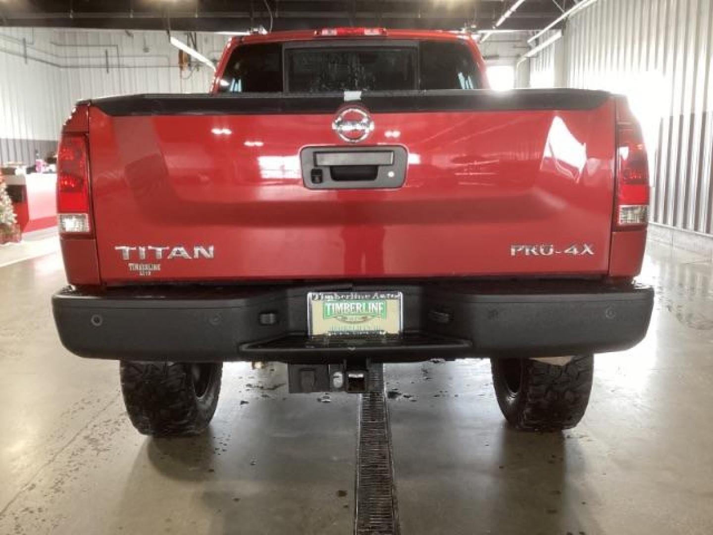 2014 Venetian Ruby /Charcoal II Nissan Titan PRO-4X Crew Cab 4WD SWB (1N6AA0ECXEN) with an 5.6L V8 DOHC 32V engine, 5-Speed Automatic transmission, located at 1235 N Woodruff Ave., Idaho Falls, 83401, (208) 523-1053, 43.507172, -112.000488 - Photo#3