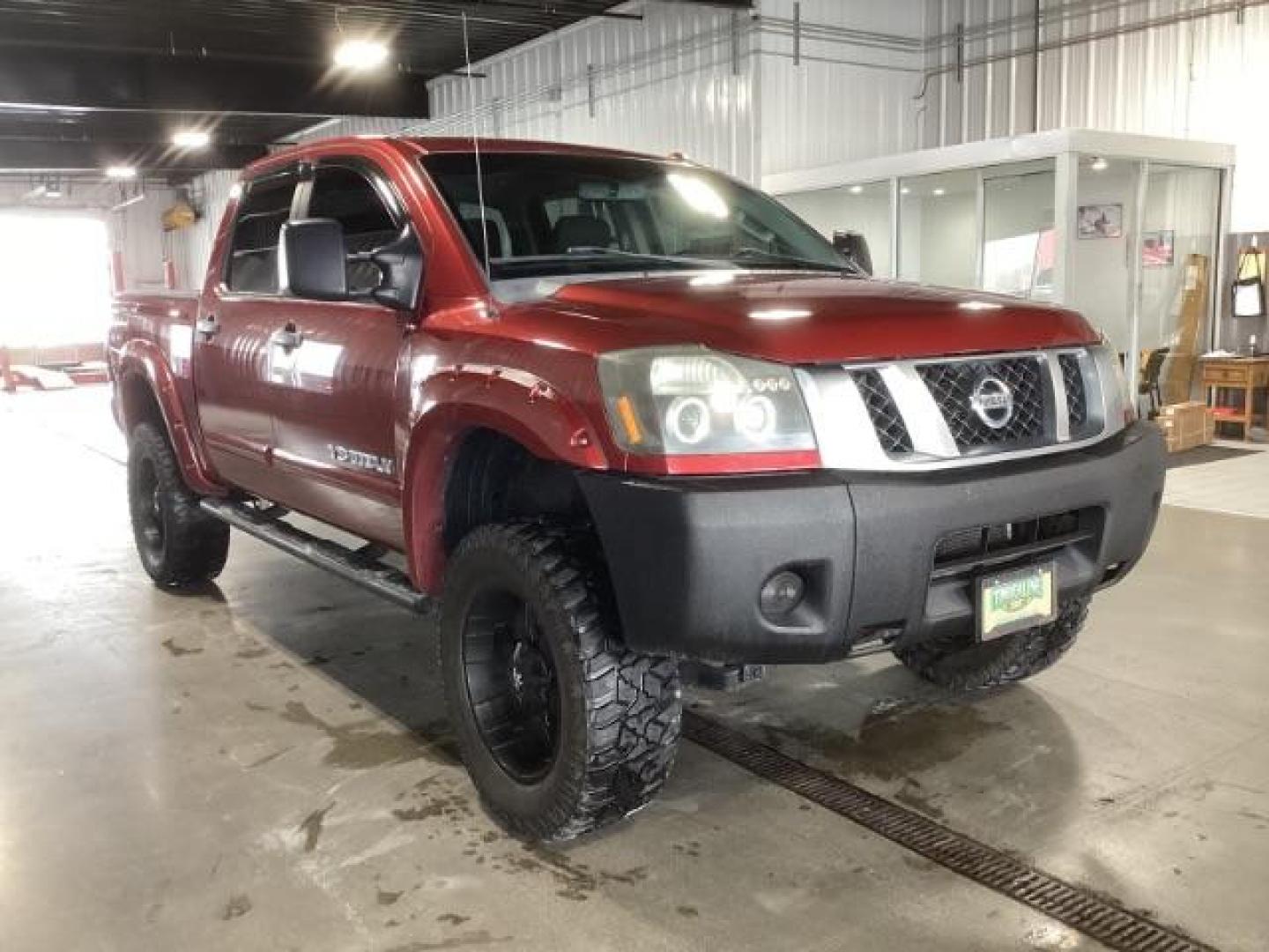 2014 Venetian Ruby /Charcoal II Nissan Titan PRO-4X Crew Cab 4WD SWB (1N6AA0ECXEN) with an 5.6L V8 DOHC 32V engine, 5-Speed Automatic transmission, located at 1235 N Woodruff Ave., Idaho Falls, 83401, (208) 523-1053, 43.507172, -112.000488 - Photo#5