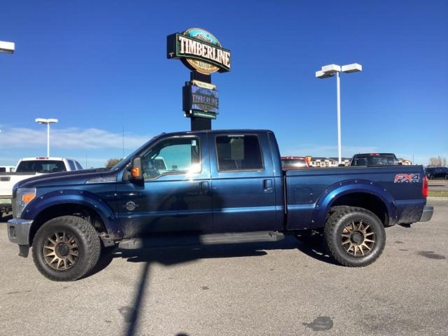 2015 Blue Jeans Metallic /Black Ford F-350 SD Lariat Crew Cab 4WD (1FT8W3BT4FE) with an 6.7L V8 OHV 16V DIESEL engine, 6-Speed Automatic transmission, located at 1235 N Woodruff Ave., Idaho Falls, 83401, (208) 523-1053, 43.507172, -112.000488 - Photo#2