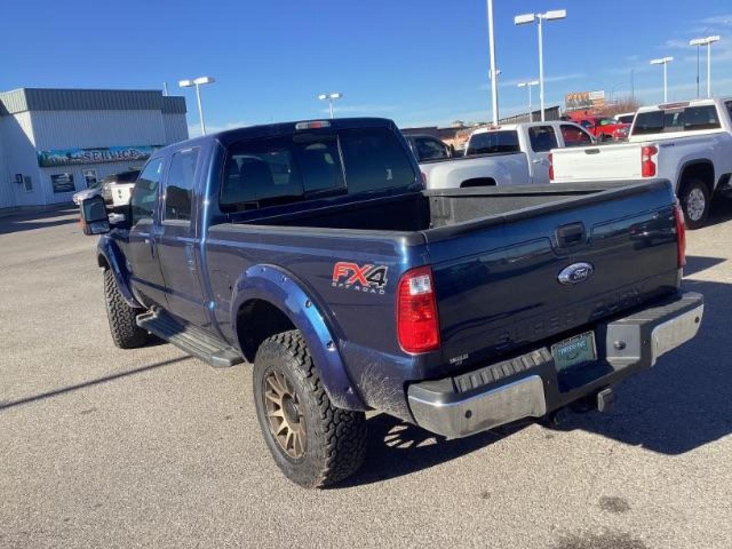 2015 Blue Jeans Metallic /Black Ford F-350 SD Lariat Crew Cab 4WD (1FT8W3BT4FE) with an 6.7L V8 OHV 16V DIESEL engine, 6-Speed Automatic transmission, located at 1235 N Woodruff Ave., Idaho Falls, 83401, (208) 523-1053, 43.507172, -112.000488 - Photo#3