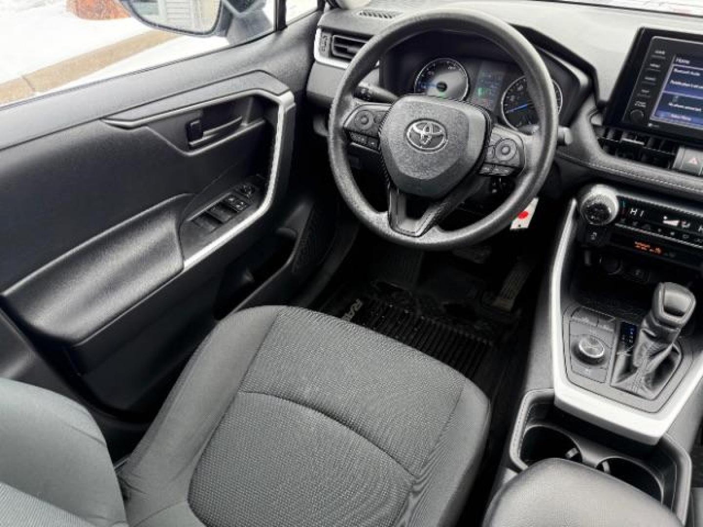 2021 Silver Sky Metallic /Black, cloth Toyota RAV4 Hybrid LE (4T3L6RFVXMU) with an 2.5L L4 DOHC 16V HYBRID engine, Continuously Variable Transmission transmission, located at 1235 N Woodruff Ave., Idaho Falls, 83401, (208) 523-1053, 43.507172, -112.000488 - Photo#19