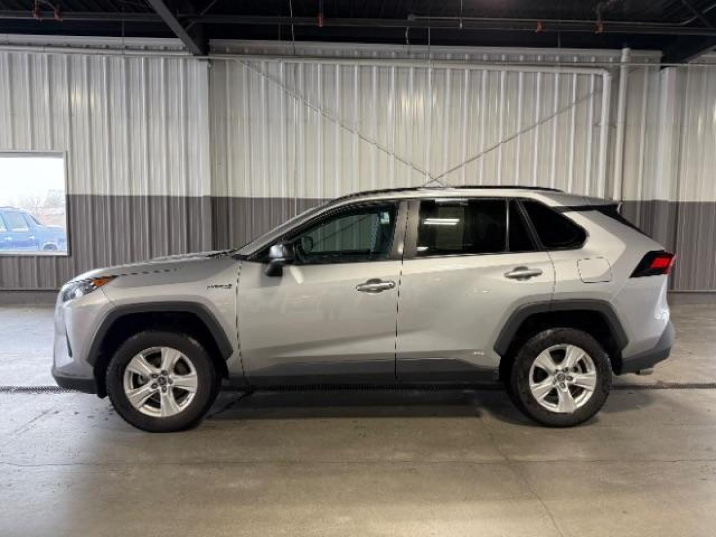 2021 Silver Sky Metallic /Black, cloth Toyota RAV4 Hybrid LE (4T3L6RFVXMU) with an 2.5L L4 DOHC 16V HYBRID engine, Continuously Variable Transmission transmission, located at 1235 N Woodruff Ave., Idaho Falls, 83401, (208) 523-1053, 43.507172, -112.000488 - Photo#2