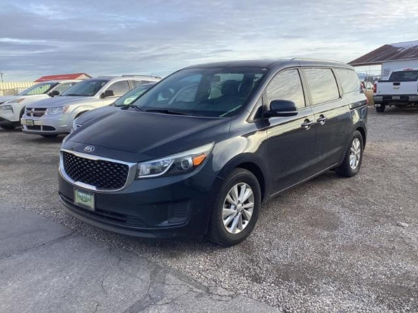 2016 Kia Sedona LX (KNDMB5C16G6) with an 3.3L V6 DOHC 24V engine, 6-Speed Automatic transmission, located at 1235 N Woodruff Ave., Idaho Falls, 83401, (208) 523-1053, 43.507172, -112.000488 - Photo#0