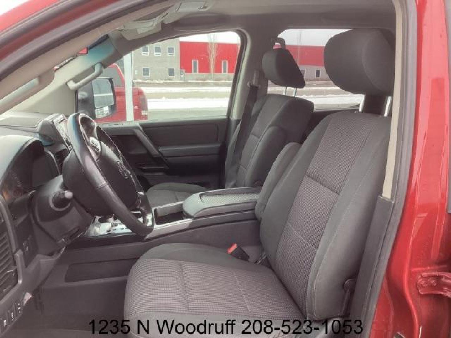 2014 Cayenne Red Metallic /Charcoal Nissan Titan SL Crew Cab 4WD (1N6AA0EC1EN) with an 5.6L V8 DOHC 32V engine, 5-Speed Automatic transmission, located at 1235 N Woodruff Ave., Idaho Falls, 83401, (208) 523-1053, 43.507172, -112.000488 - Photo#9