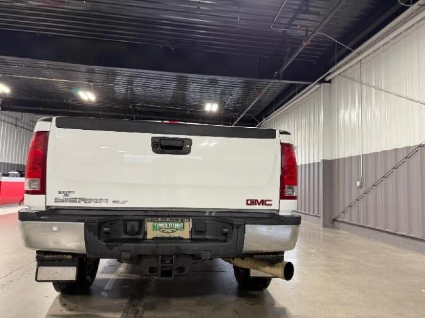 2012 Summit White /Ebony Leather Interior GMC Sierra 2500HD SLT Crew Cab 4WD (1GT121E8XCF) with an 6.6L V8 OHV 32V TURBO DIESEL engine, 6-Speed Automatic transmission, located at 1235 N Woodruff Ave., Idaho Falls, 83401, (208) 523-1053, 43.507172, -112.000488 - Photo#3