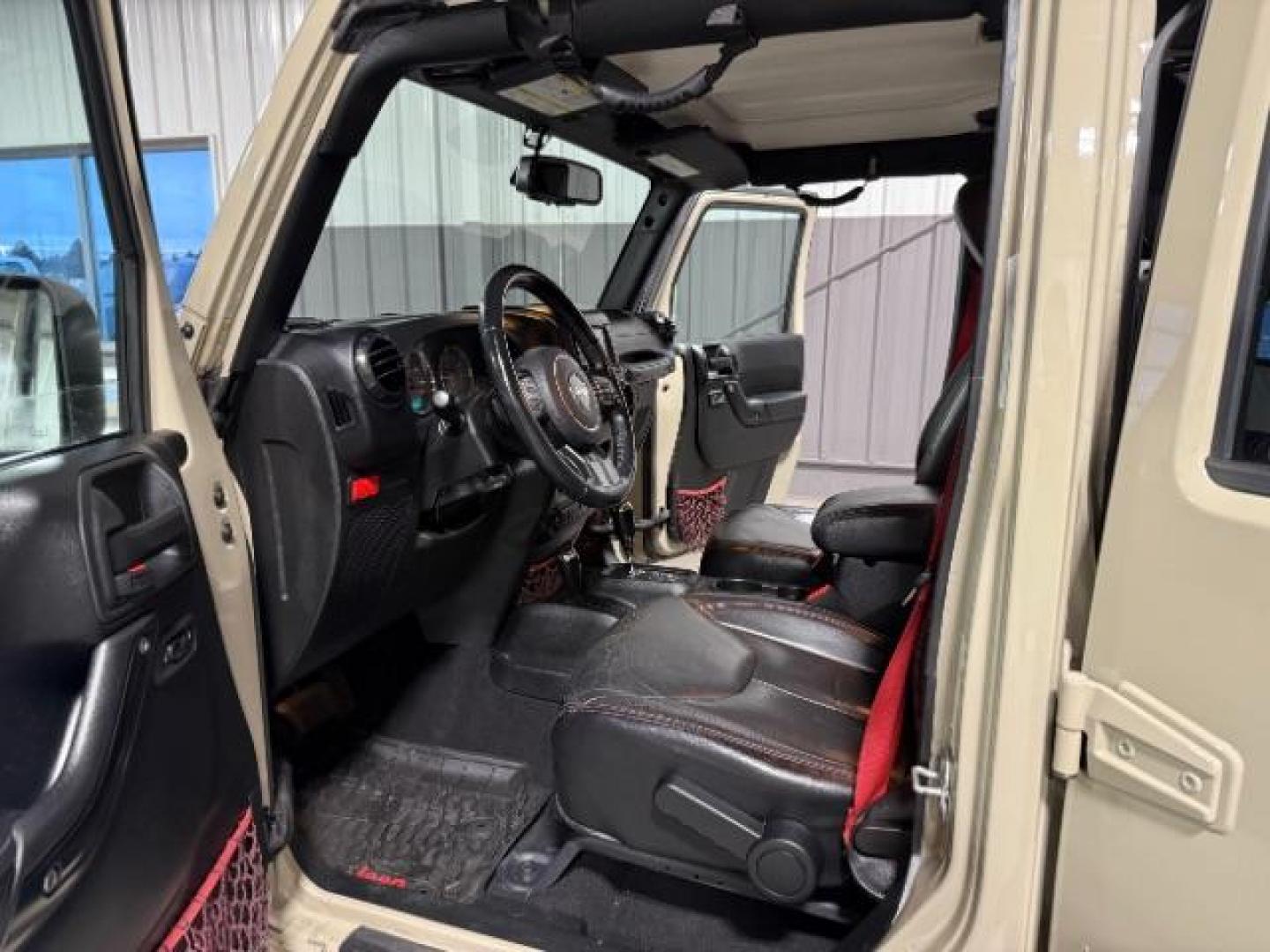 2018 TAN /Black, leather Jeep Wrangler JK Unlimited Rubicon 4WD (1C4BJWFG4JL) with an 3.6L V6 DOHC 24V FFV engine, 6-Speed Automatic transmission, located at 1235 N Woodruff Ave., Idaho Falls, 83401, (208) 523-1053, 43.507172, -112.000488 - Photo#11