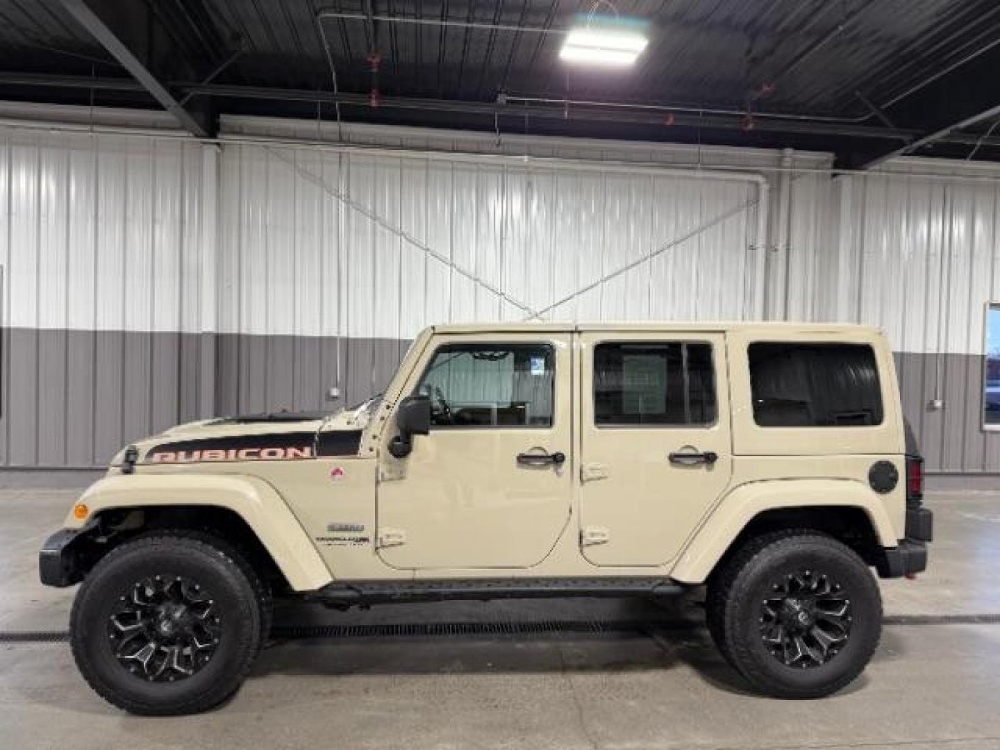 2018 TAN /Black, leather Jeep Wrangler JK Unlimited Rubicon 4WD (1C4BJWFG4JL) with an 3.6L V6 DOHC 24V FFV engine, 6-Speed Automatic transmission, located at 1235 N Woodruff Ave., Idaho Falls, 83401, (208) 523-1053, 43.507172, -112.000488 - Photo#1